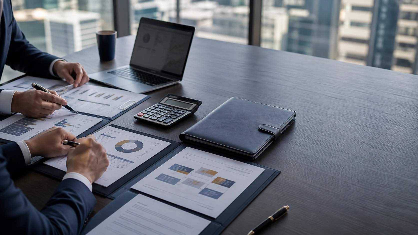 Business professionals reviewing financial statements and corporate documents for a capital raise